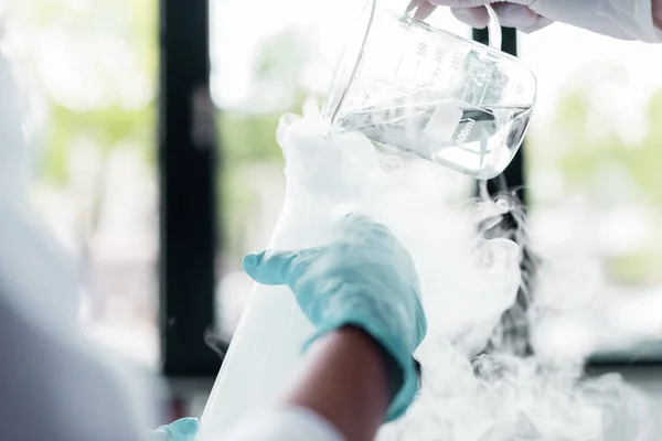 Scientists making experiment — Stock Photo