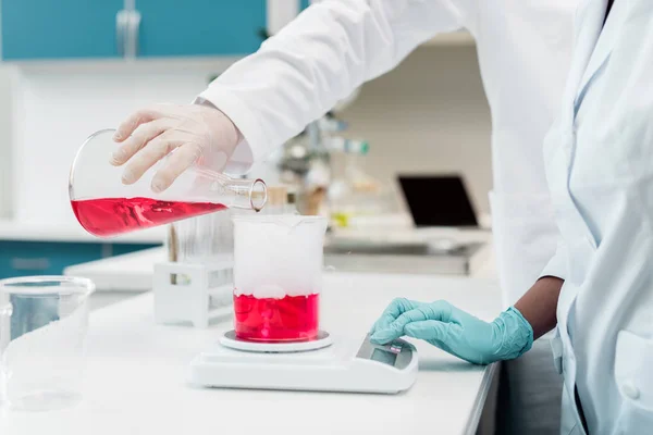 Scientists making experiment — Stock Photo