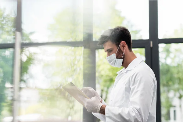 Scientist using digital tablet — Stock Photo