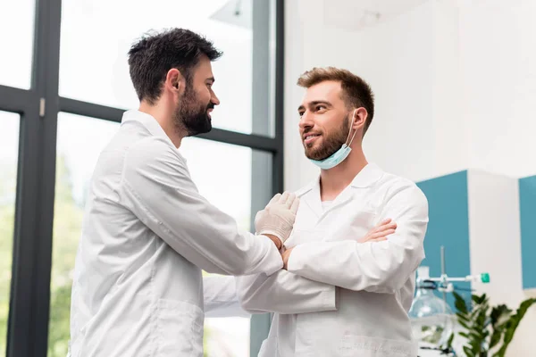 Handsome young scientists — Stock Photo