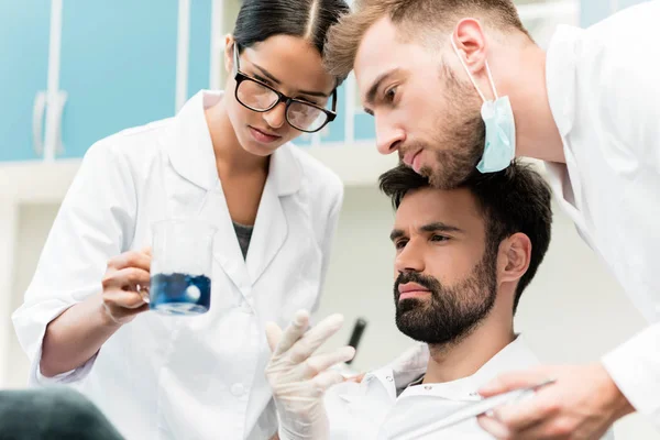 Scientists making experiment — Stock Photo