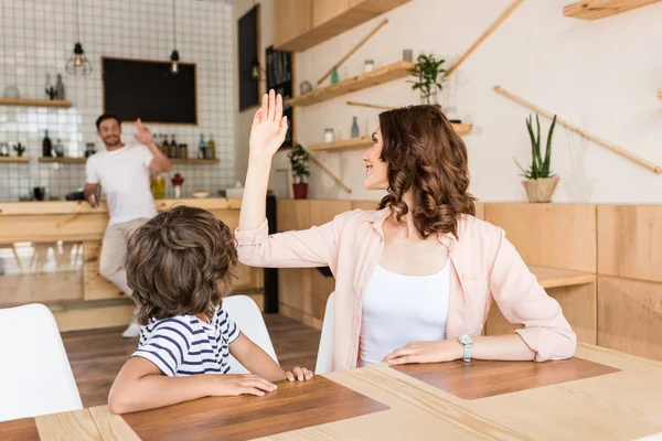Woman with her son in cafe — Stock Photo