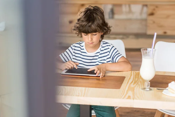 Little boy with digital tablet — Stock Photo