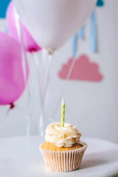 Delicious cupcake with candle — Stock Photo