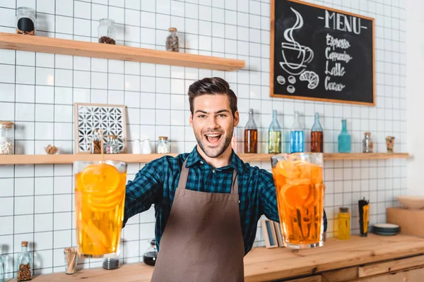 Barman with refreshing lemonades — Stock Photo