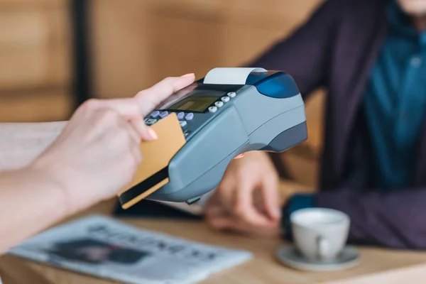 Payment with credit card in cafe — Stock Photo