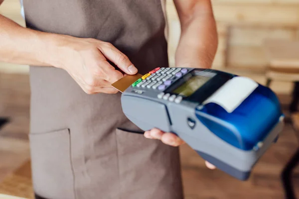 Waiter with payment terminal — Stock Photo