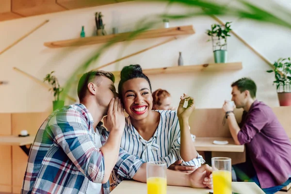 Multiethnic couple in cafe — Stock Photo