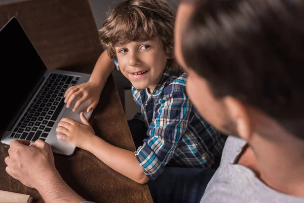 Kid with laptop — Stock Photo