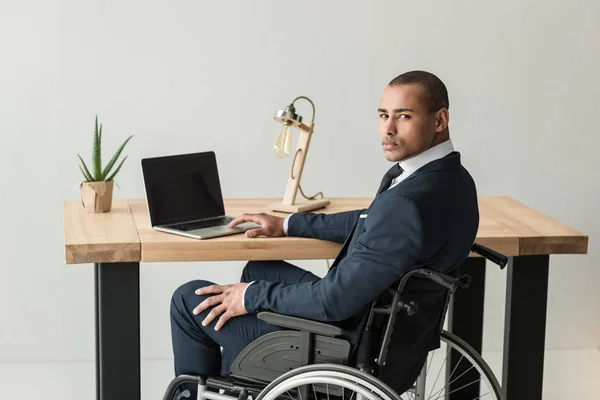 Disabled african american businessman — Stock Photo