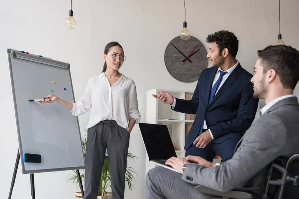 Multicultural businesspeople working together — Stock Photo