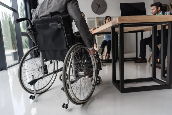 Businessman in wheelchair — Stock Photo