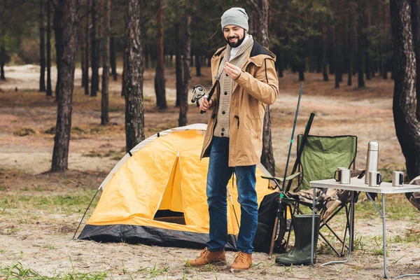 Man with fishing rod — Stock Photo