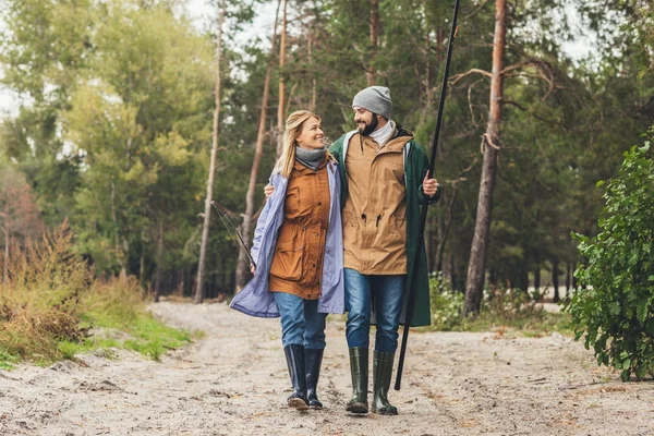 Couple going from fishing — Stock Photo