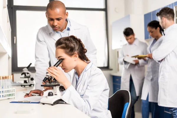 Female scientist at laboratory — Stock Photo