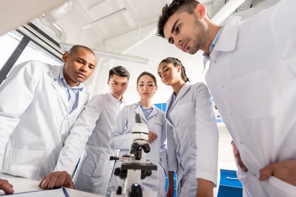 Medical workers in circle — Stock Photo