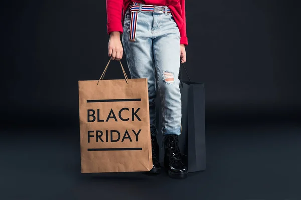 Bambino con shopping bags — Foto stock