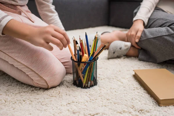 Kid taking pencils — Stock Photo