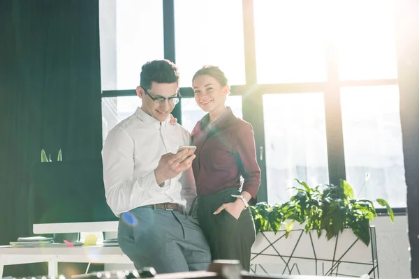 Young businesspeople couple at modern office — Stock Photo