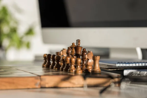 Close-up shot of chess board at workplace — Stock Photo