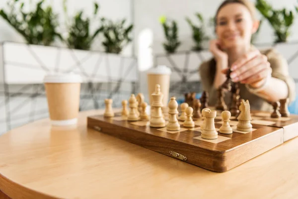 Close-up shot of young couple playing chess — Stock Photo