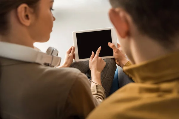 Close-up shot of young couple using tablet together — Stock Photo