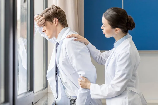 Upset doctor thinking — Stock Photo, Image