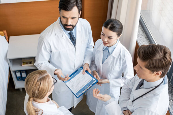 doctors team discussing diagnosis