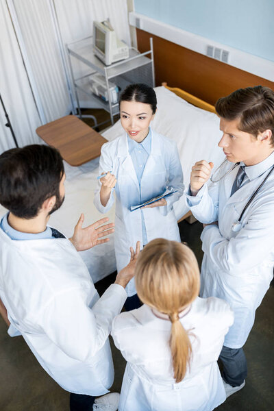 doctors team discussing diagnosis