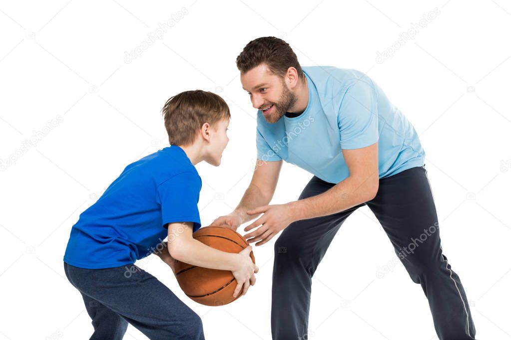 Father and son playing basketball 