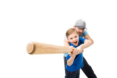 Father and son playing baseball  clipart