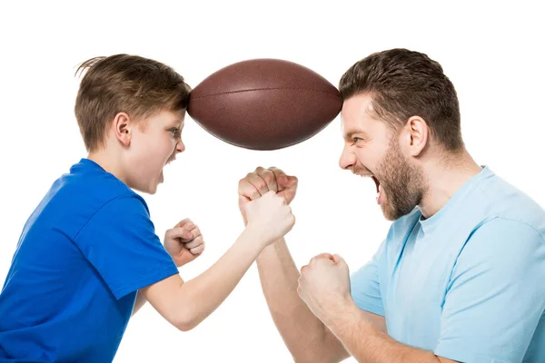 Father and son with rugby ball — Stock Photo