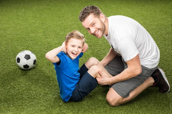 Father and son training together — Stock Photo