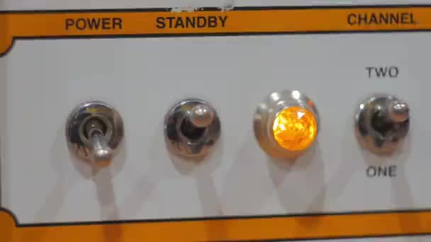 Turning guitar cab on — Stock Video