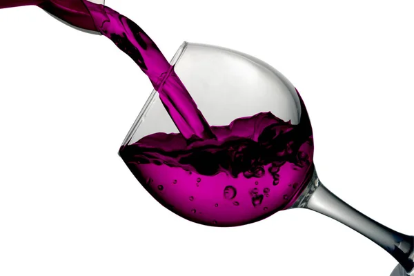 Red desert wine poured in glass on white background — Stock Photo, Image