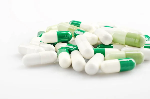 Groene en witte Capsules — Stockfoto