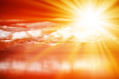 deniz üzerinde kırmızı günbatımı