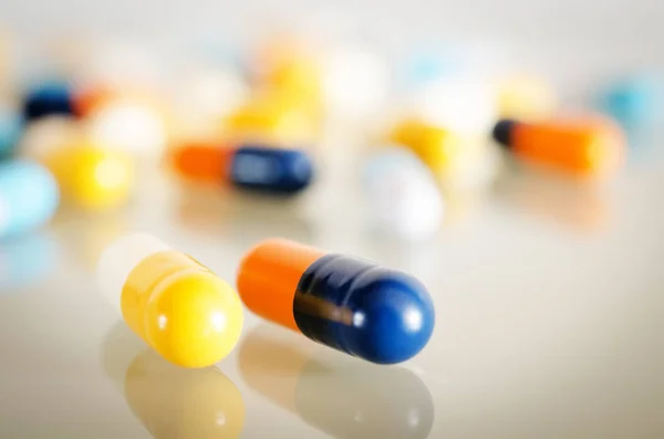 Multicolored medical capsules — Stock Photo, Image