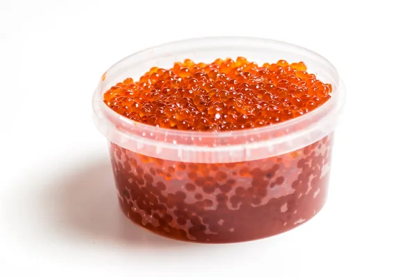 Saumon caviar rouge dans un bocal sur fond blanc — Photo