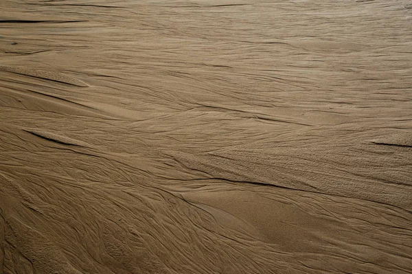 Tekstura piasek rzeczny z ślady wody przepływa — Zdjęcie stockowe