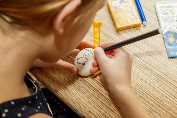 Painting Easter eggs at home before Easter