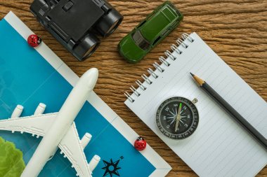 travel planning road trip concept with airplane, passport, compa clipart