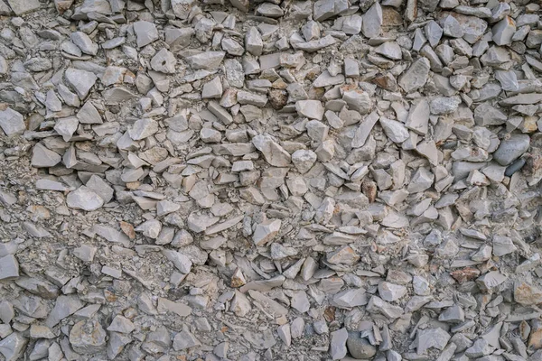 Текстура каменной стены в Matera, Италия в качестве фона — стоковое фото