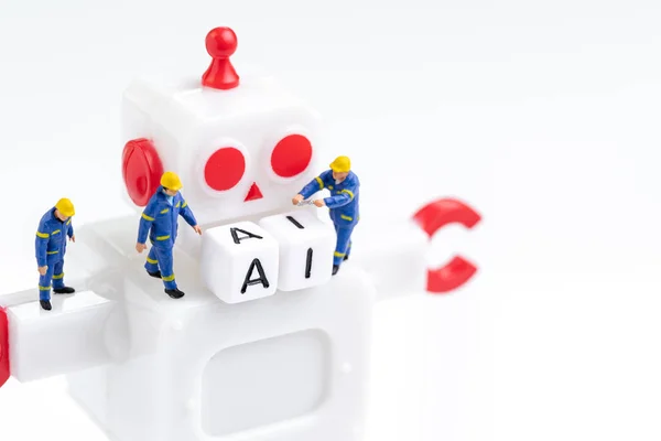 Miniature people technology guys working on cube block building — Stock Photo, Image