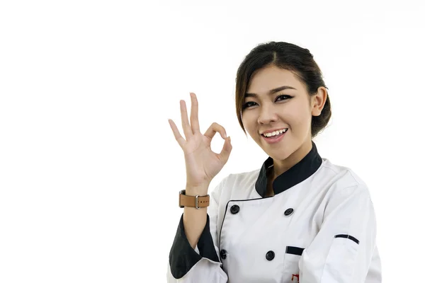 Portrét šéfkuchař Asian mladá žena izolovaných na bílém pozadí — Stock fotografie