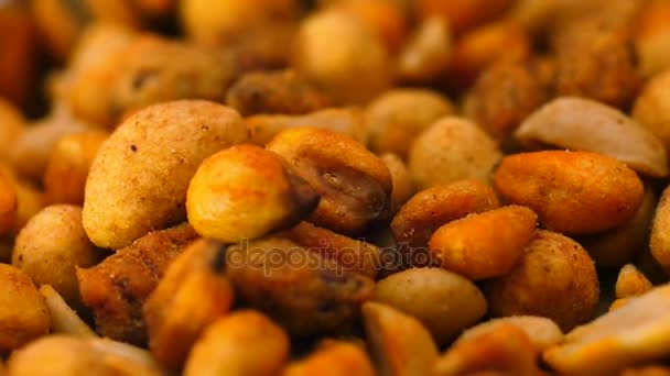 Bowl of mixed nuts — Stock Video