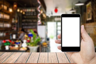 Görüntü siyah cep telefonu boş beyaz ekran ile tutarak el kadar alay.