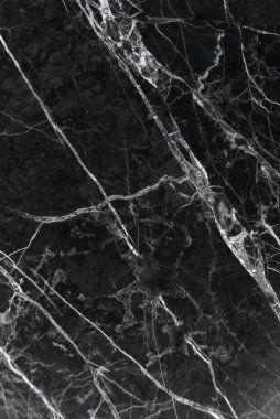 Narin damarlar ile siyah mermer doku, arka plan veya arka plan için doğal desen, Ayrıca mimari levha, seramik zemin ve duvar karoları yüzey etkisi oluşturmak kullanılabilir.