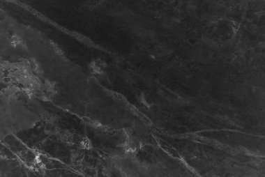 Narin damarlar ile siyah mermer doku, arka plan veya arka plan için doğal desen, Ayrıca mimari levha, seramik zemin ve duvar karoları yüzey etkisi oluşturmak kullanılabilir.