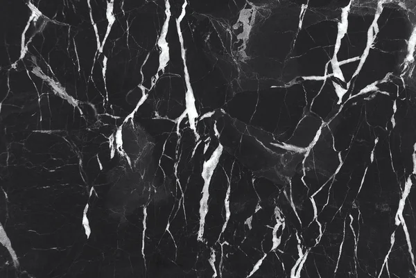 Narin damarlar ile siyah mermer doku, arka plan veya arka plan için doğal desen, Ayrıca mimari levha, seramik zemin ve duvar karoları yüzey etkisi oluşturmak kullanılabilir.